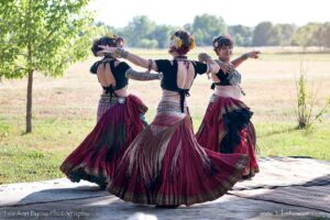 Nawaar Dance Company troupe members, Steph, Jennifer & Kristin perform at the Farm 2023