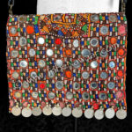 Sienna vintage textile leather purse with coins available thru The Nawaar Marketplace at www.TribeNawaar.com (detail)