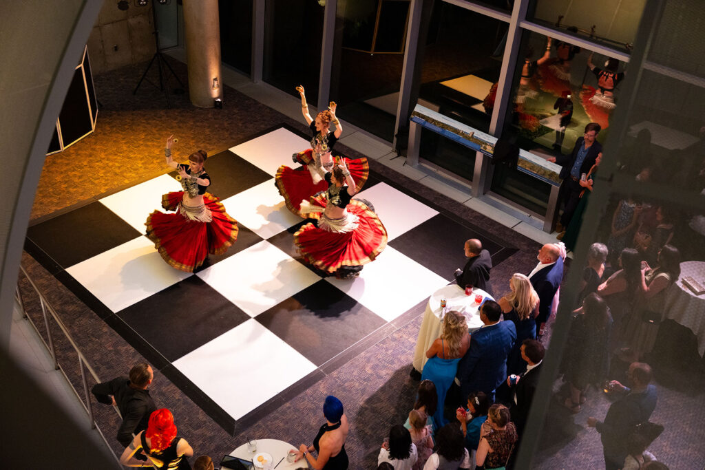 Nawaar Dance Company performs at a private wedding event at The Denver Museum of Nature and Science, troupe photo by Michelle Christiance